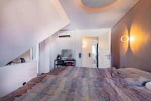 Schlafzimmer mit Balkon